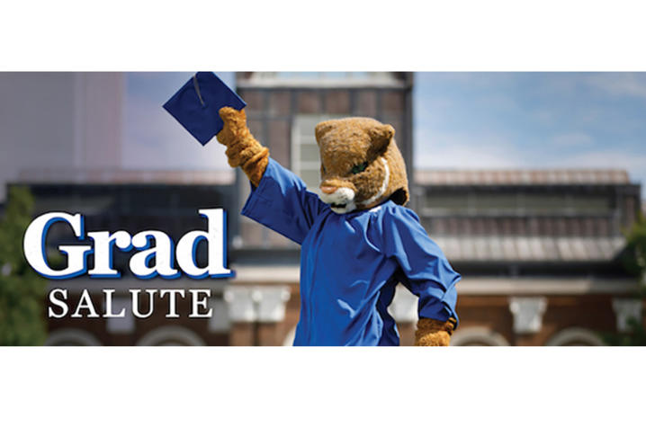 photo of the UK Wildcat mascot with a graduation gown on and holding a mortarboard, with the words "Grad Salute"