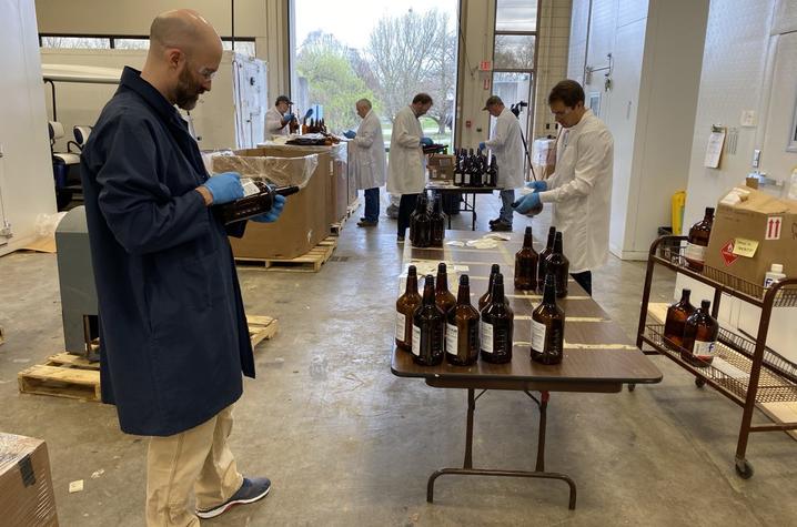 Brad Berron, left, and Seth DeBolt, right, in lab