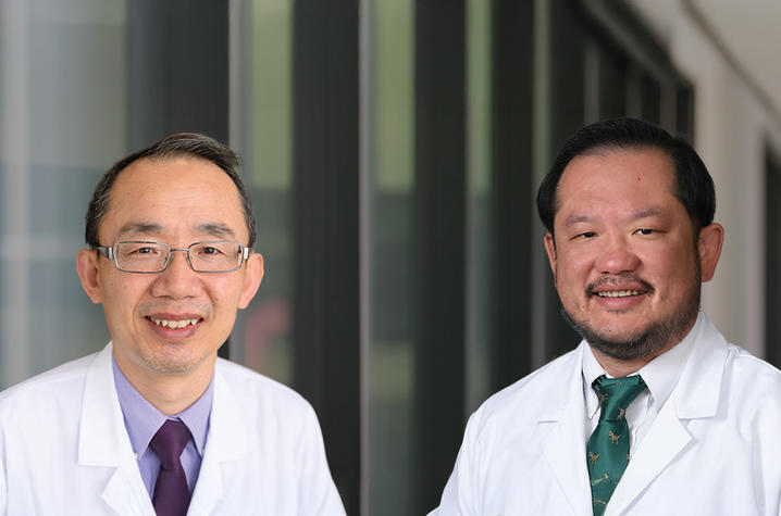 UK Markey Cancer Center physician-scientists Zhonglin Hao and Eddy Yang 