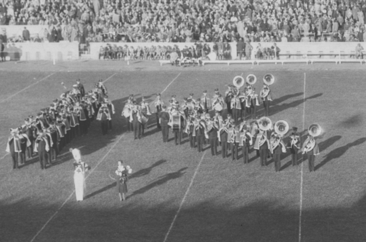 old photo of the band on the field 