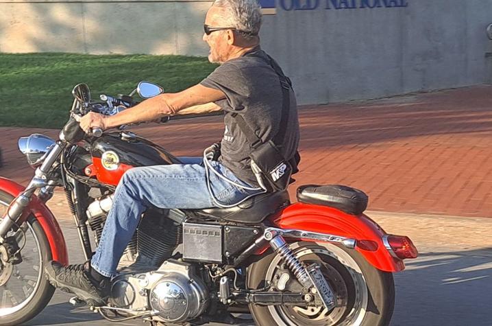 Image of Bobby riding motorcycle