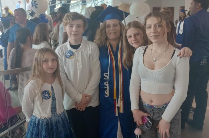 Alexandrea Shouse walked across the stage Dec. 20 surrounded by her kids. Photo provided. 