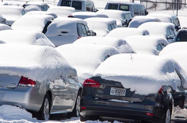 Cars in the UK motor pool covered in snow