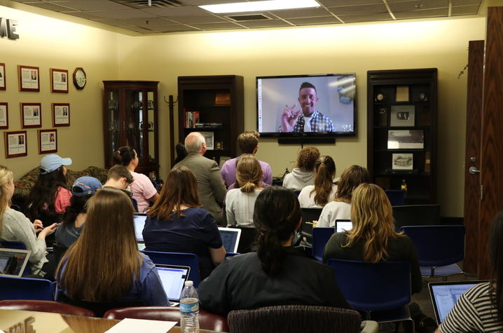 Photo of Beau Loendorf Skyping UK ISC students 