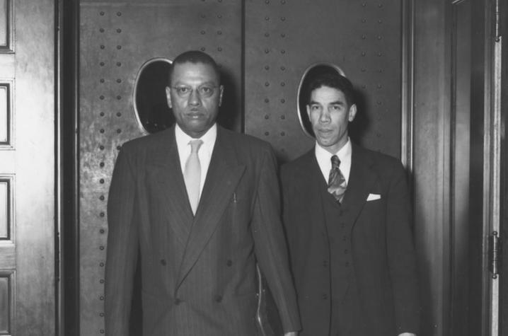 photo of Lyman T. Johnson leaving court in 1949