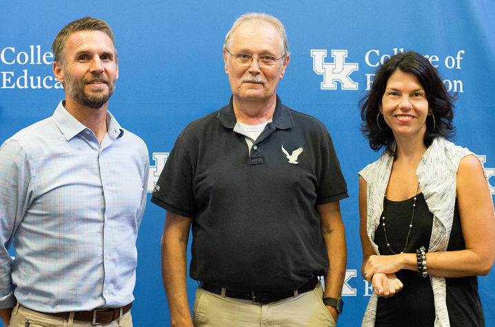 photo of  Ryan Crowley, assistant professor in the UK College of Education Department of Curriculum and Instruction, Lester Beaty, nephew of Private Joe Stanton Elmore, and Kathy Swan, professor in the Department of Curriculum and Instruction