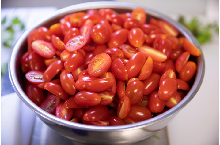 Bowl of sliced roma tomatoes