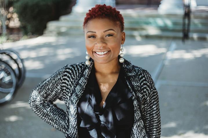 College of Education student Natalie Malone pictured in dark shirt and jacket