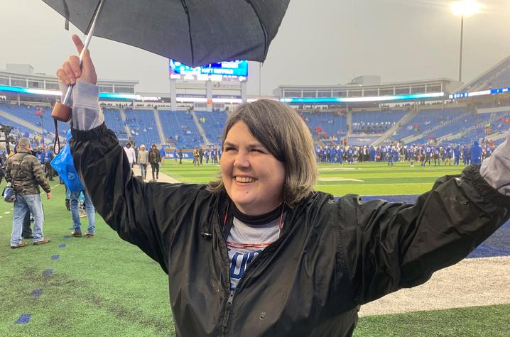 Photo of UK alum Ouita Michel during recognition at Kroger Field