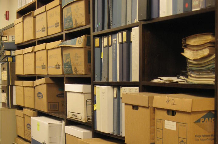 photo of shelves of boxes and binders