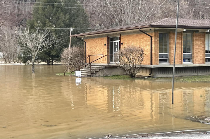 The main office building at UK's Robinson Center for Appalachian Resource Sustainability during flooding brought by torrential rains