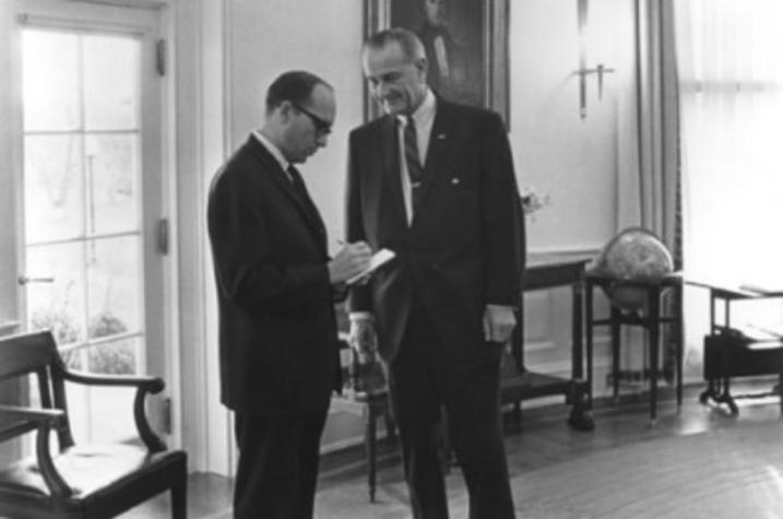 black and white photo of Sid Davis interviewing LBJ in White House