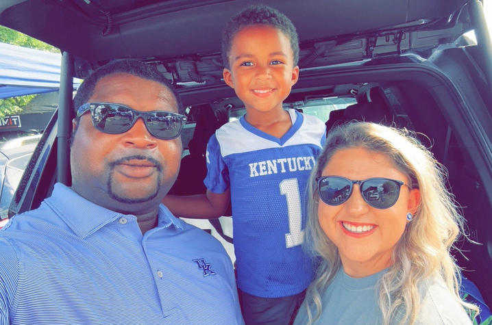 Brandon Stockton with his wife and son.