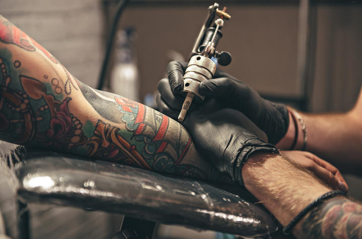 A new study finds that tattooed skin does not sweat as much as non-inked areas of the body | Photo from Getty Images.