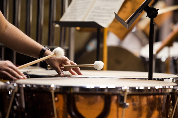 photo of hands playing timpani