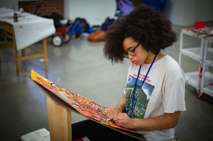photo of young lady in GSA visual arts class working