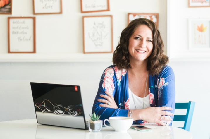 woman sitting with computer 