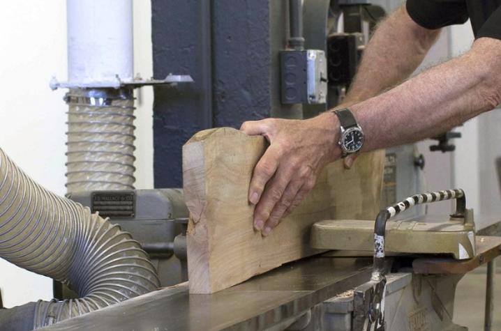 photo of a mans hands working in a woodworking class at Fine Arts Institute