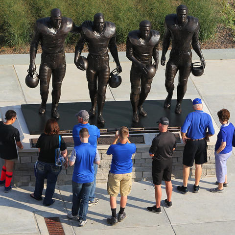 Statues outside the stadium at UK of the four football players who broke the color line in the SEC in the 1960s. From left to right, Greg Page, Nate Northington, Wilbur Hackett, and Houston Hogg.