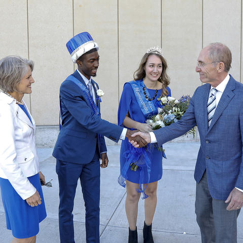 President and Dr. Capilouto congratulate the 2016 Homecoming King and Queen