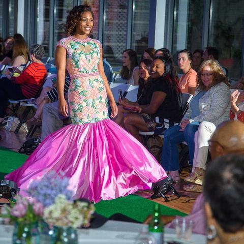 photo of student modeling dress in Color Me Spring fashion show