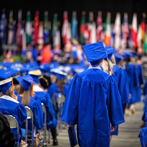 students walking at UK Commencement