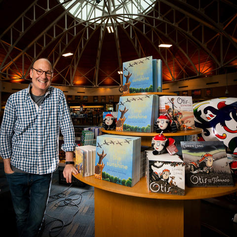 Loren Long with display of his children's books at Joseph-Beth Bookseller