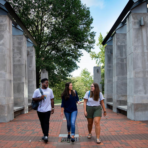 photo of 3 students walking in Engineering quad