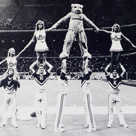 black and white photo of UK Cheerleaders in pyramid from 1985 Kentuckian
