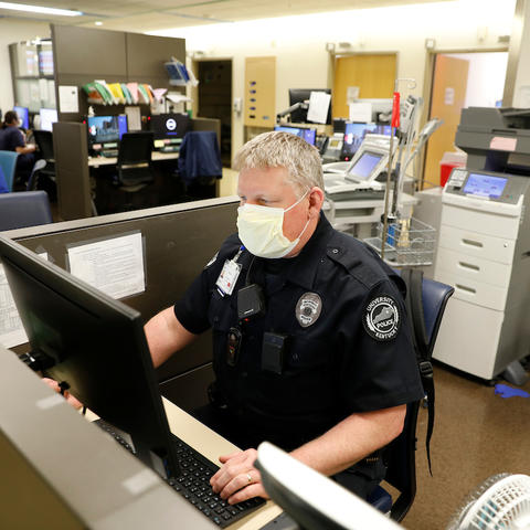 Photo of UKPD security office working in health care setting
