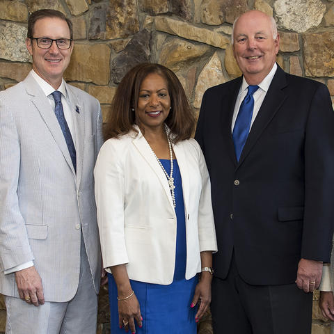 The UK Alumni Association officers for 2018-2019 are, from left, Timothy Walsh (secretary), Taunya A. Phillips (president-elect), J. Fritz Skeen (president); and Hannah Miner Myers (treasurer). Photo by Tim Webb