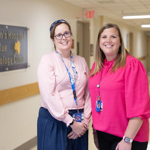 Image of the school intervention specialists in front of clinic sign