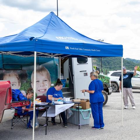 UK HealthCare's mobile care unit in Hazard, Ky. offered basic wound care and vaccinations in the days following the flooding. Team members also handed out backpacks with supplies for flood survivors. Photo by Hilary Brown.
