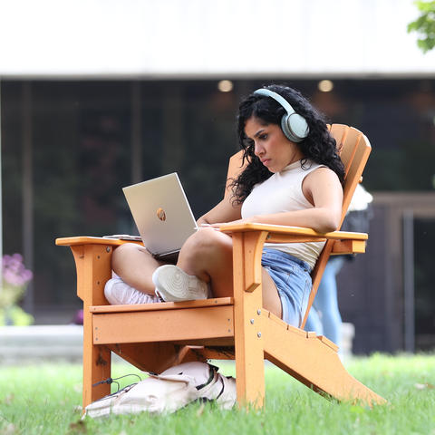 girl sitting using laptop. 