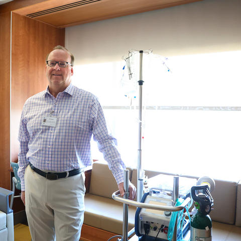 Photo of Mark with ECMO device