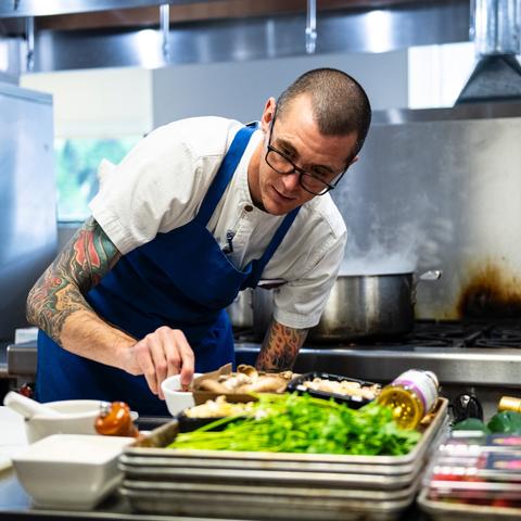 Chef Trevor Morones won the cooking challenge for appetizer and dessert. Photo by Tim Webb.