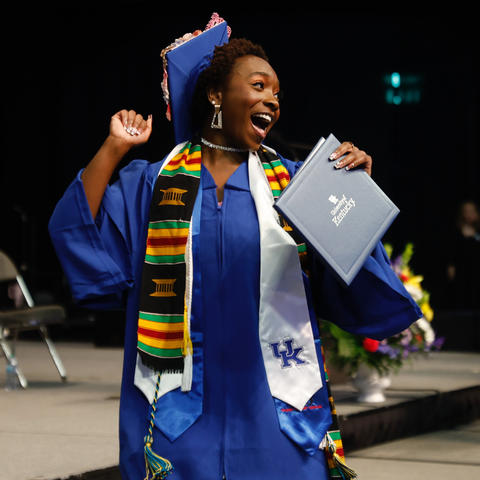This is a photo of a new UK graduate at Commencement. 