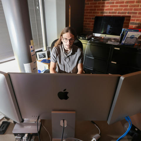 Brent Harrison, professor in College of Engineering works on his computer. Photo by    Mark Cornelison | UK Photo 