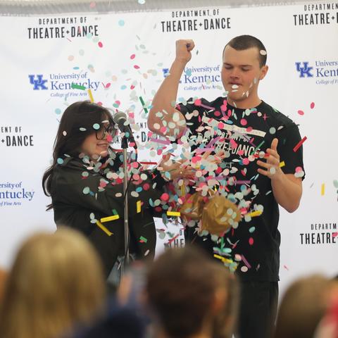 Students popping a balloon at UK Theatre and Dance season reveal event