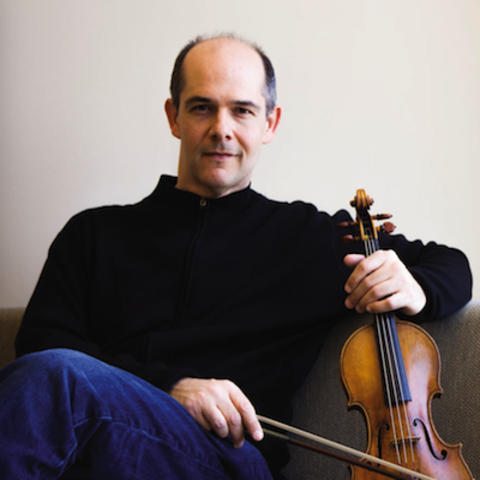 photo of Alexander Kerr seated with violin