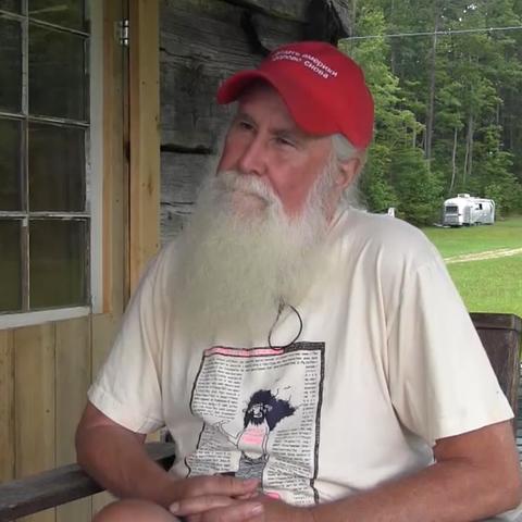 photo of Jim Webb on front porch interviewing on Appalshop
