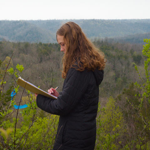 Callie Black conducts research
