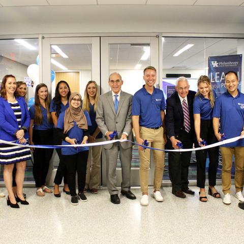 photo of President Capilouto and others cutting ribbon to open Center for Student Philanthropy