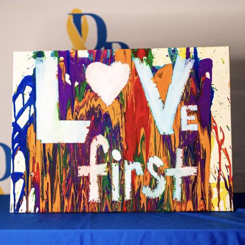 DanceBlue artwork that reads "love first"