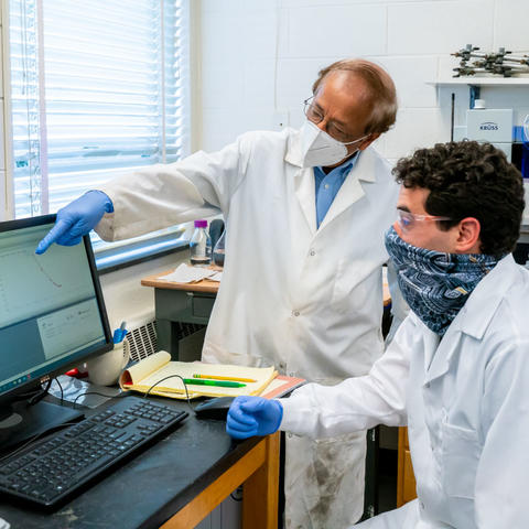 UK engineering professor Dibakar Bhattacharyya, or "DB," directing research in his lab. With co-researchers, DB is creating a membrane-based medical face mask for COVID-19. Photo by Ben Corwin, Research Communications
