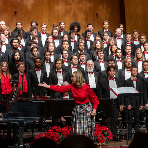 A chorus performing on stage
