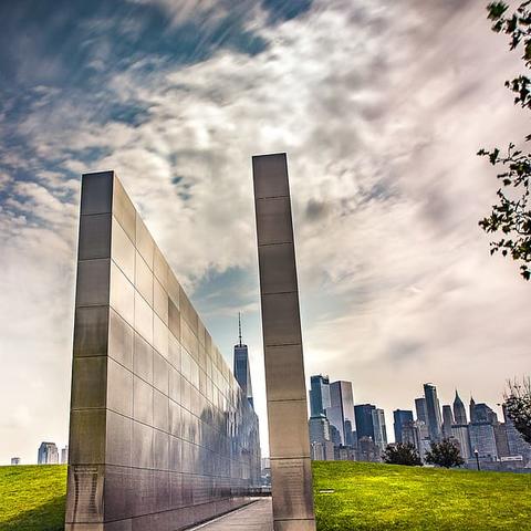 photo of Empty Sky Memorial with New York City in background
