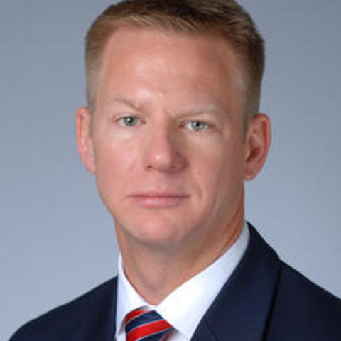 Man in navy suit