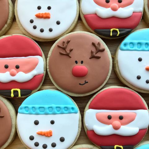 photo of Santa, snowman and reindeer cookies by Daniel King