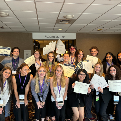 Students standing with their awards. 